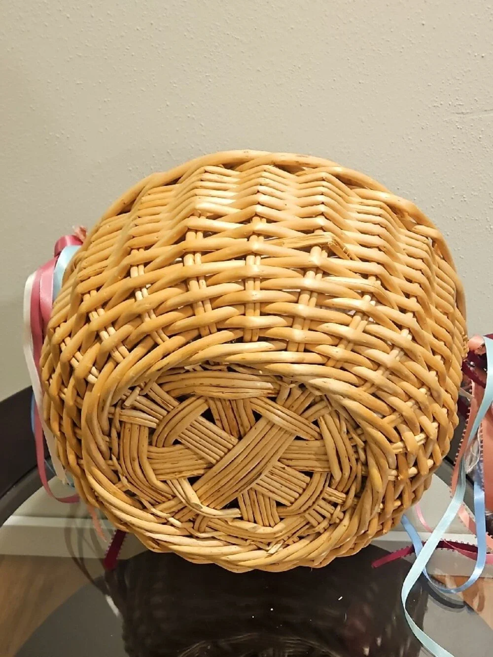 Wicker Basket with Patchwork Lined Cushion and Ribbon Accents